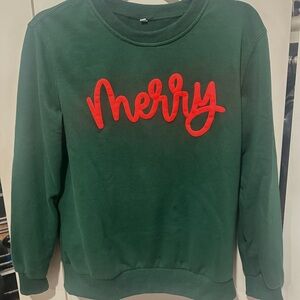 Green Sweatshirt with Red 'Merry' Text
